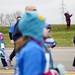 A woman walks down a hill after recording the start of the Girls on the Run 5k in Ypsilanti on Sunday. Daniel Brenner I AnnArbor.com